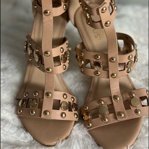 Venus strap 4”heel sandals.  It was never used.